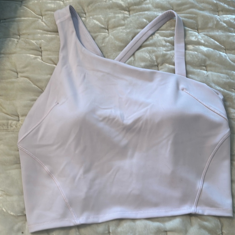 Lululemon Everlux Asymmetrical Tennis Tank. Size 12-14 (unsure). Pink.